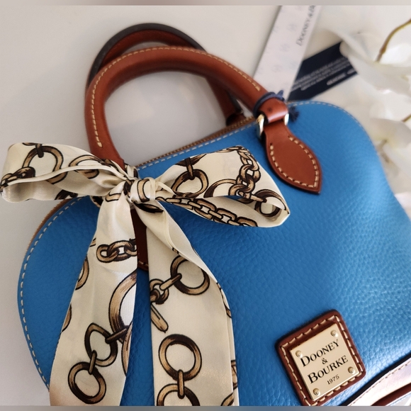 Dooney & Bourke Handbags - New With Tags! Gorgeous blue convertible Dooney & Bourke bag! Stunning color.